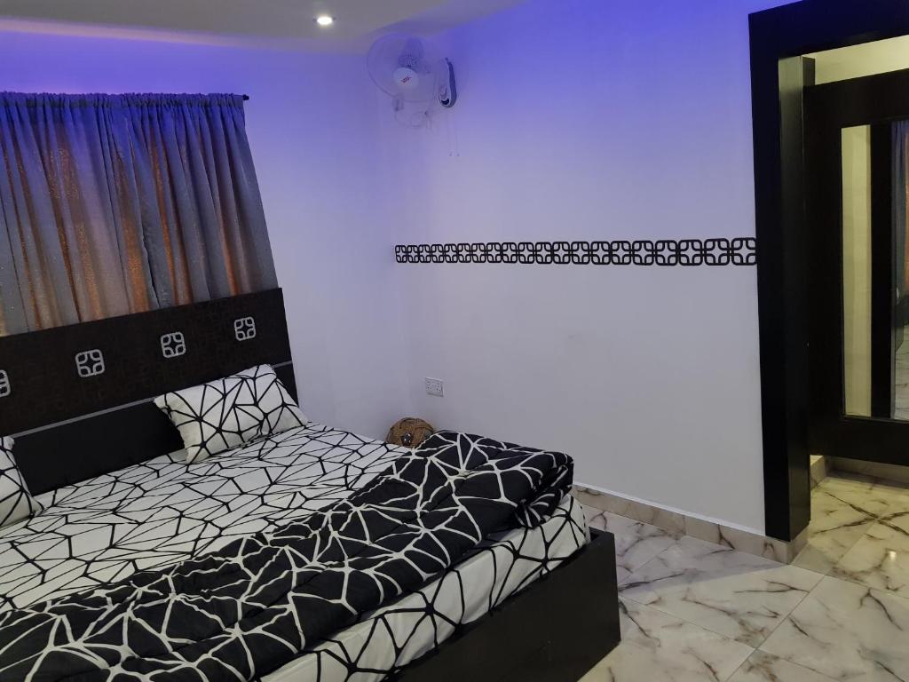 Postel nebo postele na pokoji v ubytování CG Apartments Metro