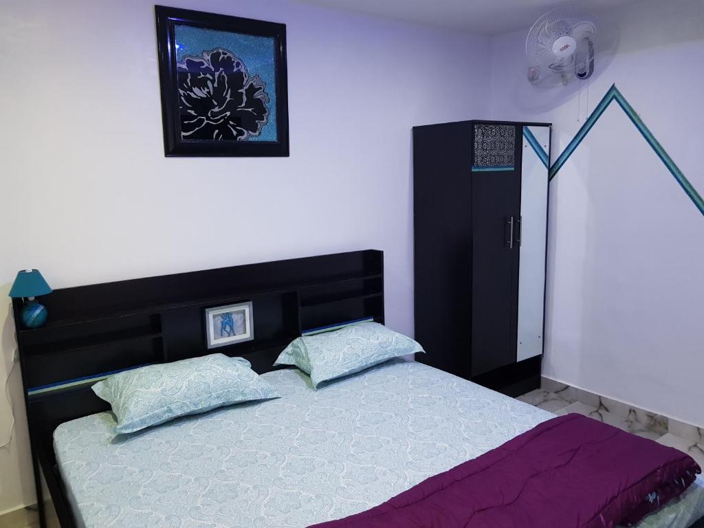 Postel nebo postele na pokoji v ubytování CG Apartments Metro