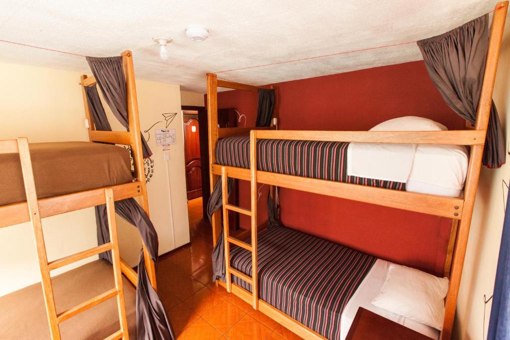 Postel nebo postele na pokoji v ubytování Papachos Hostel