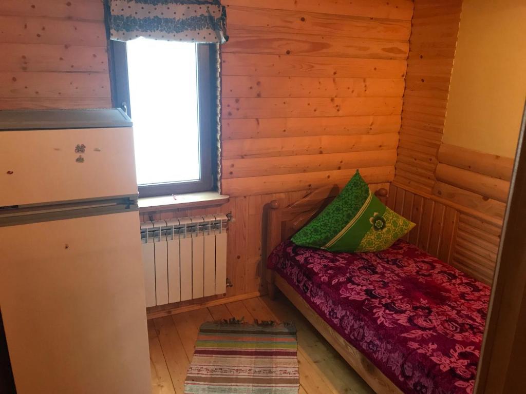 Postel nebo postele na pokoji v ubytování Shelest Vody