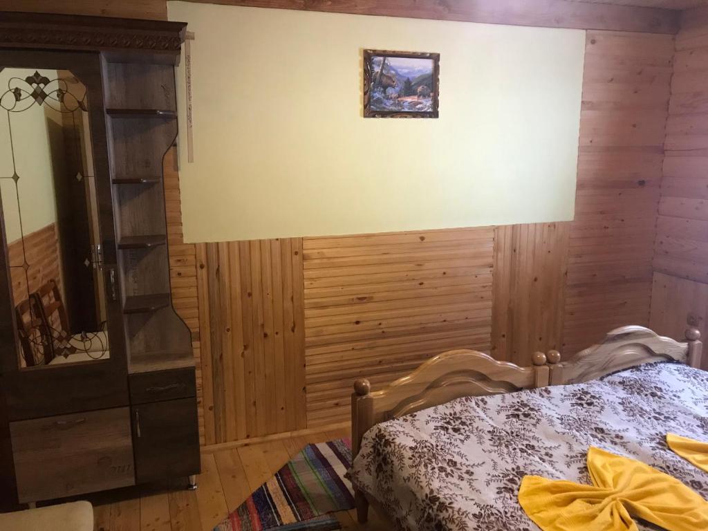 Postel nebo postele na pokoji v ubytování Shelest Vody