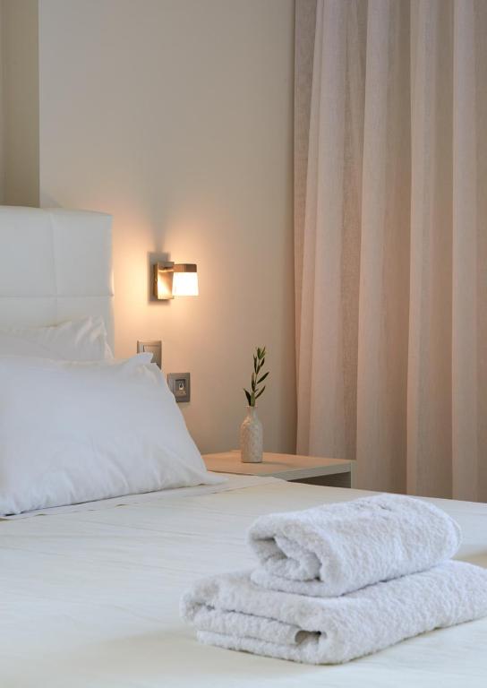 Postel nebo postele na pokoji v ubytování Altamar Hotel