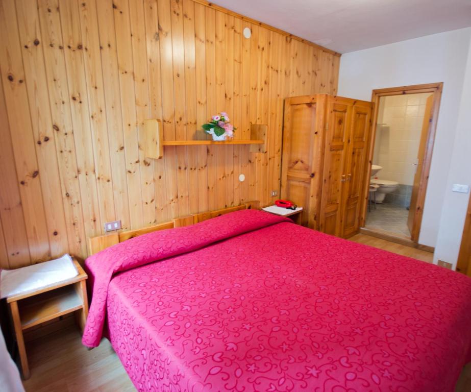 Postel nebo postele na pokoji v ubytování Meublé Albergo Dante