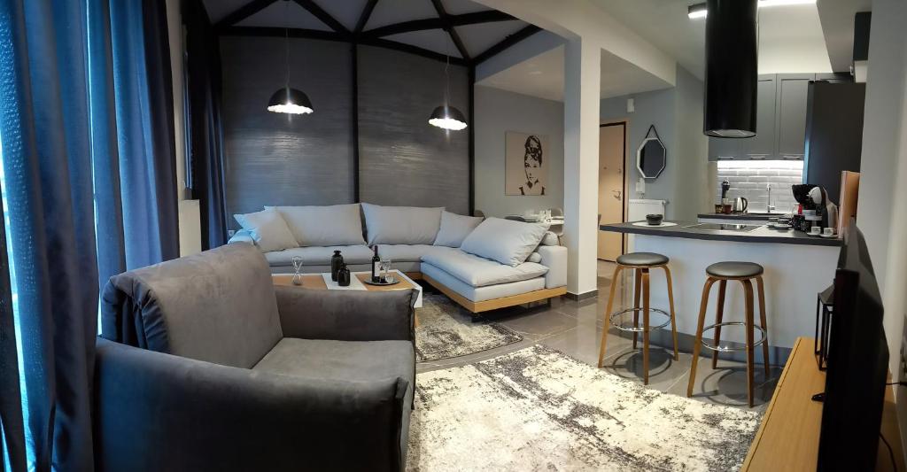 Posedenie v ubytovaní Comely luxury Apt Must