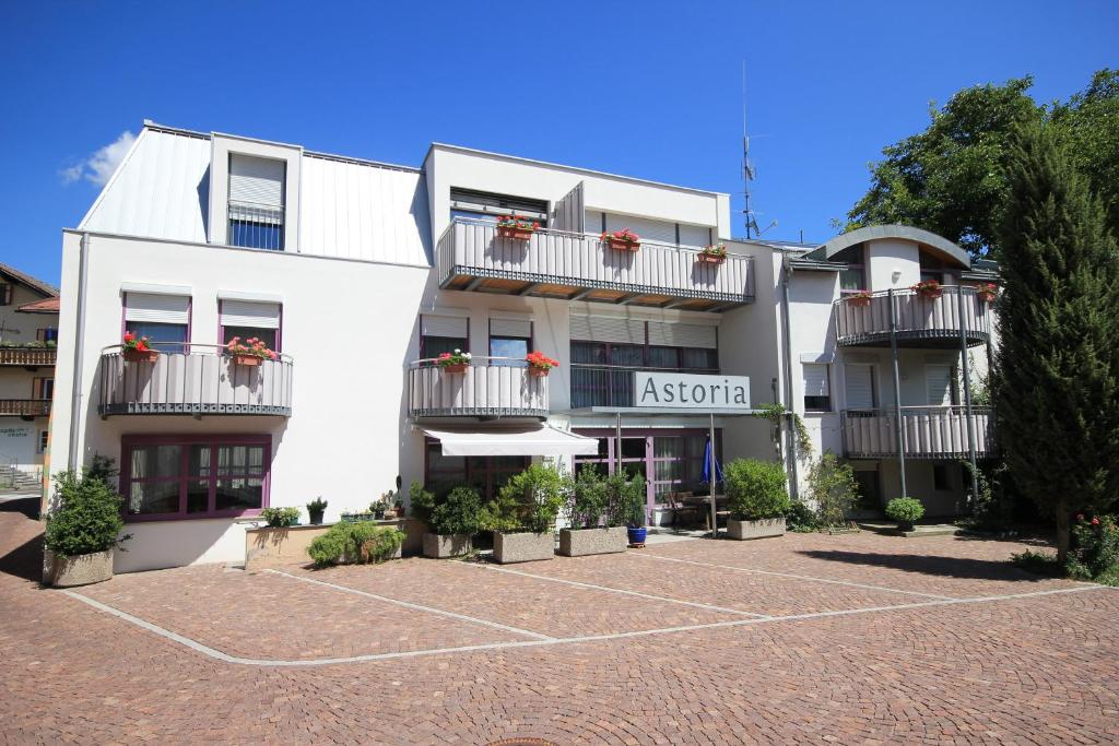 an exterior view of a apartment building at Pension & Residence Astoria in Prato allo Stelvio