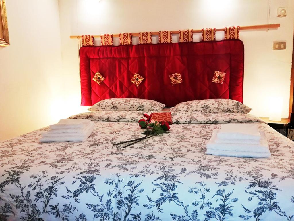 Ένα ή περισσότερα κρεβάτια σε δωμάτιο στο San leonardo