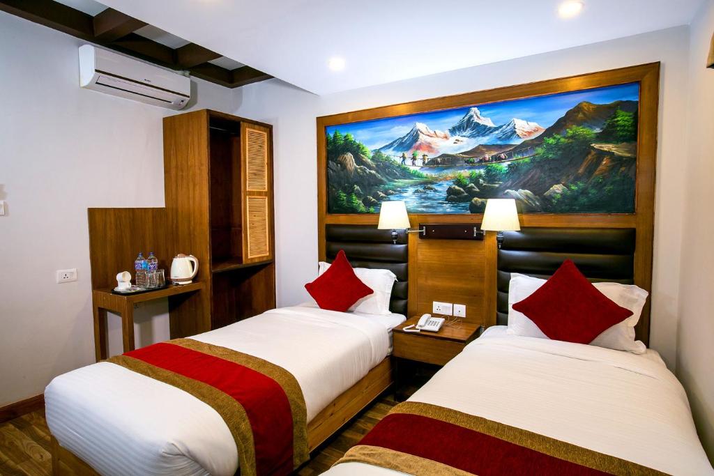 Postel nebo postele na pokoji v ubytování Beautiful Kathmandu Hotel