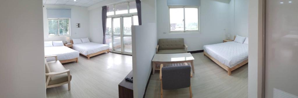 Voodi või voodid majutusasutuse Ta Li Wen B&B toas