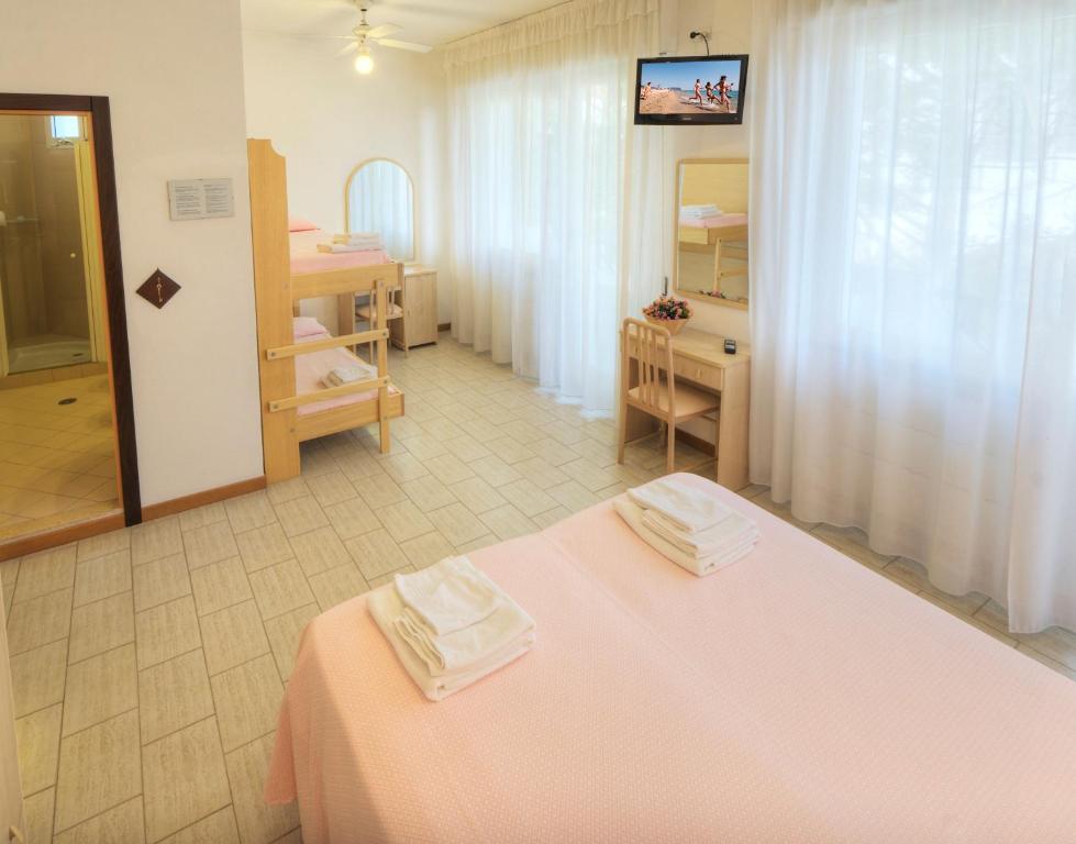 Postel nebo postele na pokoji v ubytování Hotel K2
