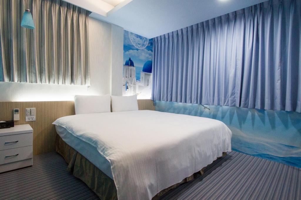 Postel nebo postele na pokoji v ubytování Morwing Hotel - Ocean