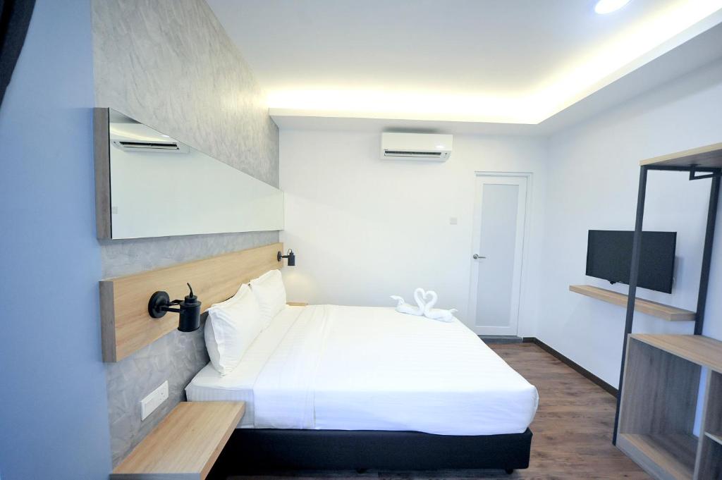 Postel nebo postele na pokoji v ubytování MYe Hotel