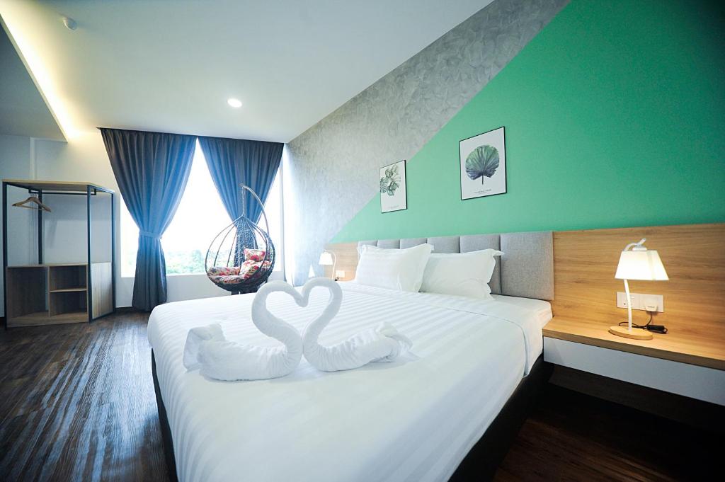 Postel nebo postele na pokoji v ubytování MYe Hotel