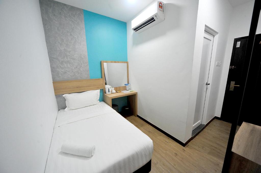Postel nebo postele na pokoji v ubytování MYe Hotel