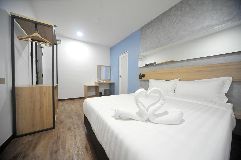Postel nebo postele na pokoji v ubytování MYe Hotel