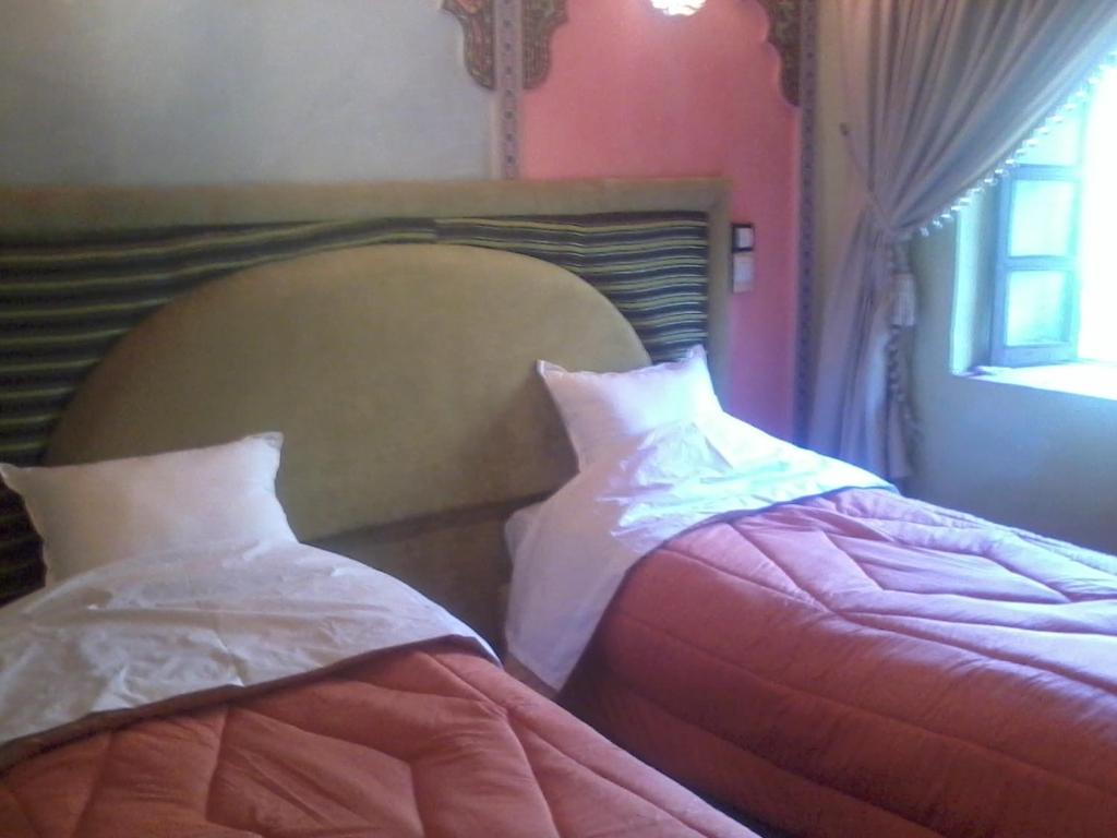 Postel nebo postele na pokoji v ubytování Gîte Atlas Mazik