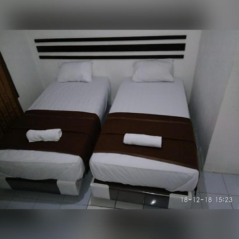 Postel nebo postele na pokoji v ubytování skyz hostel