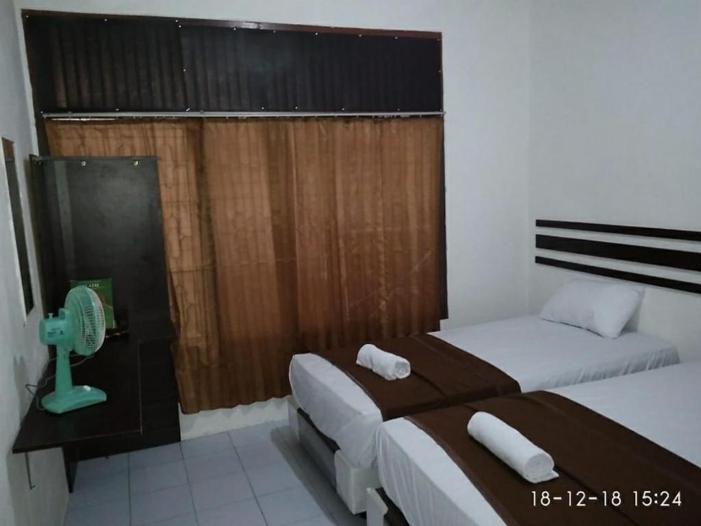 Postel nebo postele na pokoji v ubytování skyz hostel