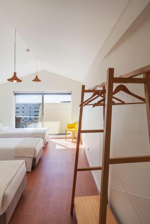 Postel nebo postele na pokoji v ubytování A Bica Hostel