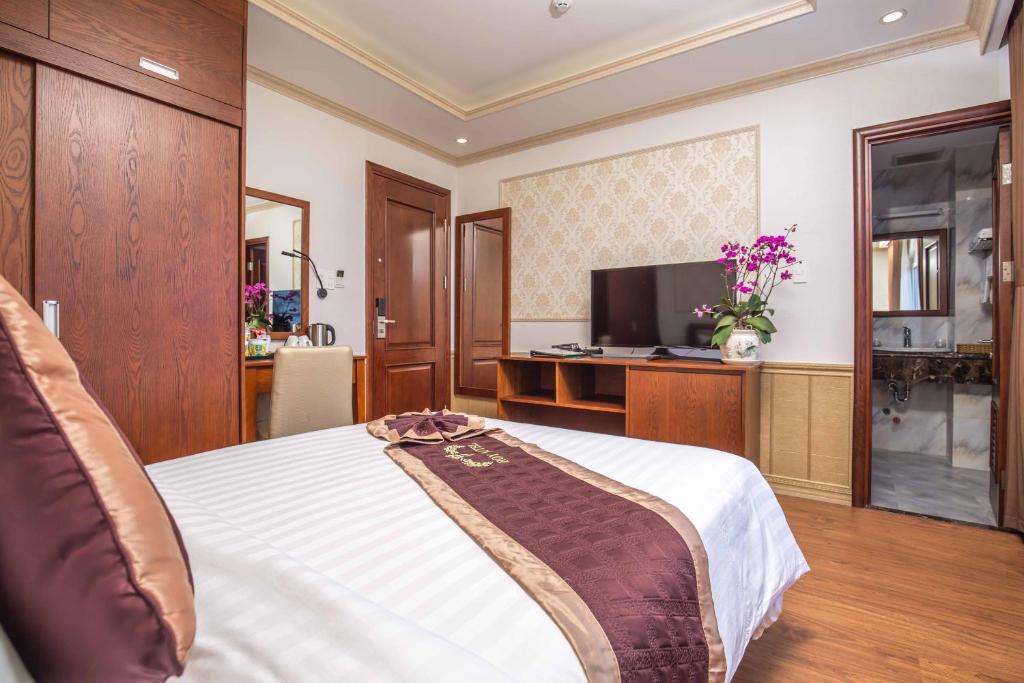 TV a/nebo společenská místnost v ubytování Roy Dala Hotel