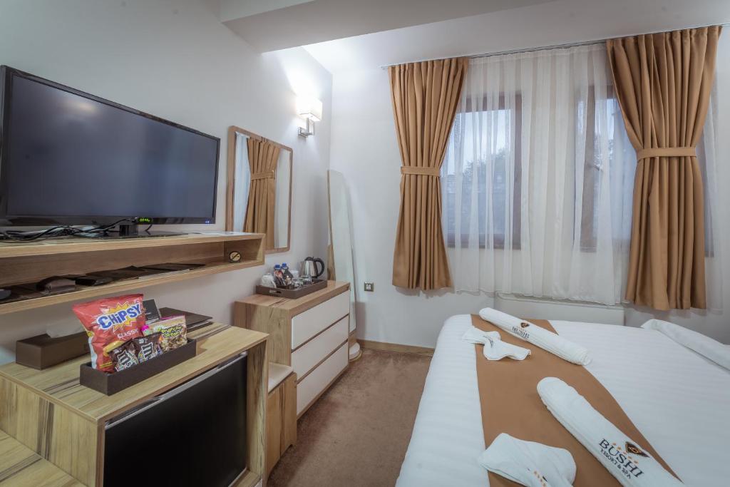 Postel nebo postele na pokoji v ubytování Bushi Resort & SPA