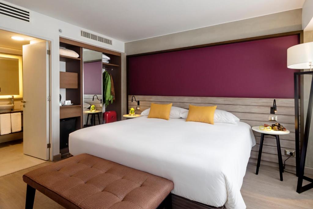 Ένα ή περισσότερα κρεβάτια σε δωμάτιο στο Mercure Ariosto Lima