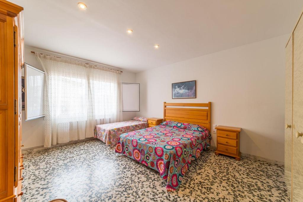 Postel nebo postele na pokoji v ubytování Villa Nuria