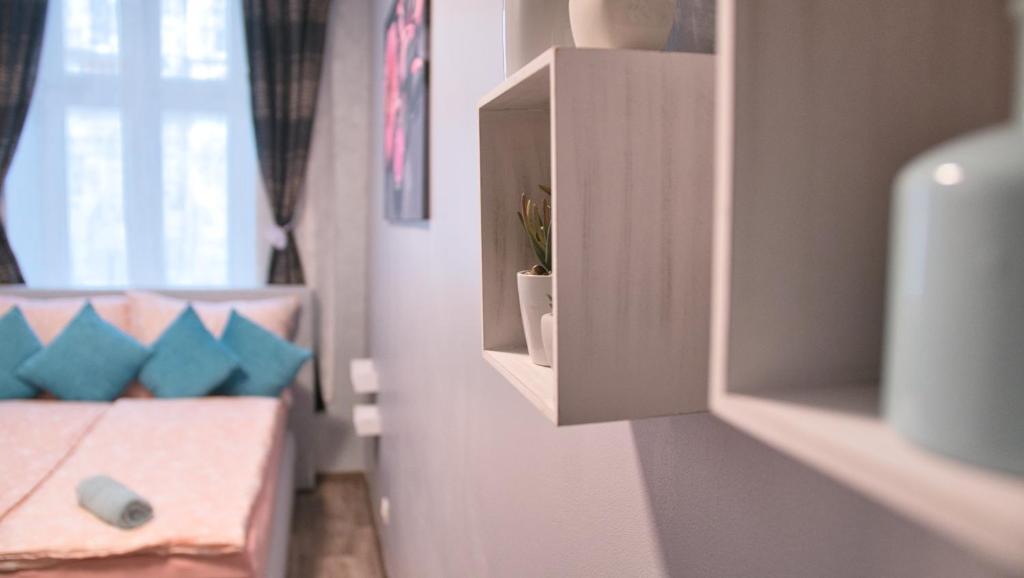 A bed or beds in a room at Minnie Mouse