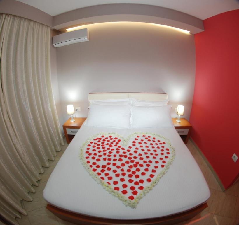 Postel nebo postele na pokoji v ubytování Hotel Divers