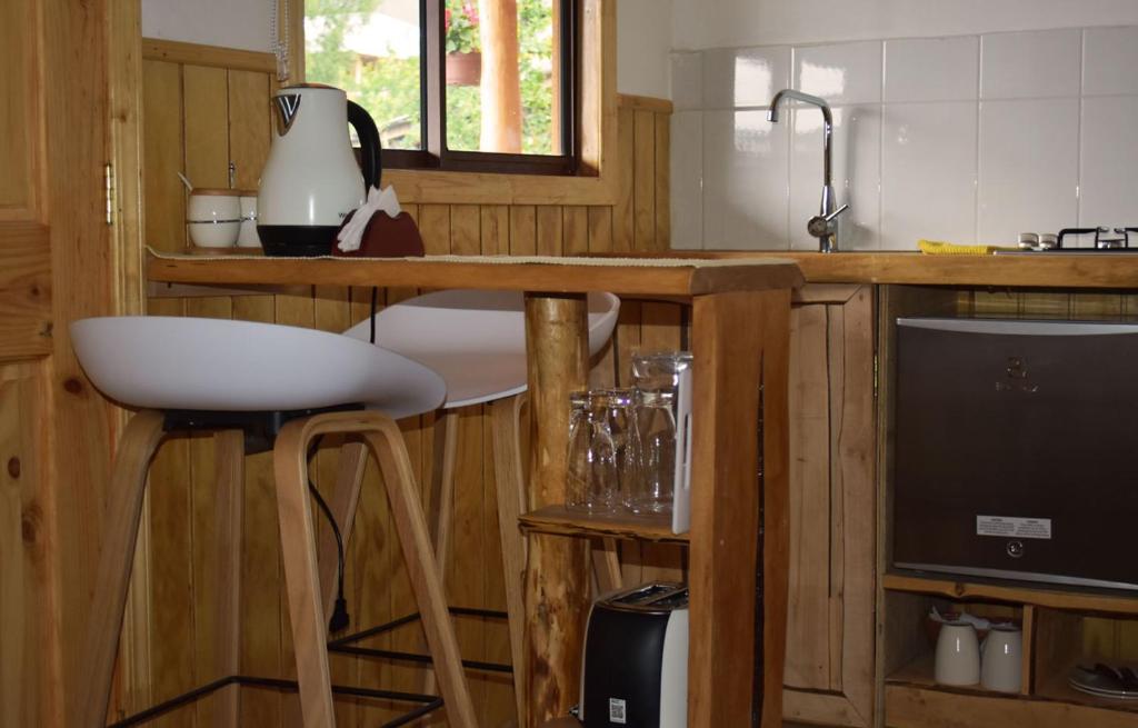 Kuchyň nebo kuchyňský kout v ubytování Apartamentos Yagan