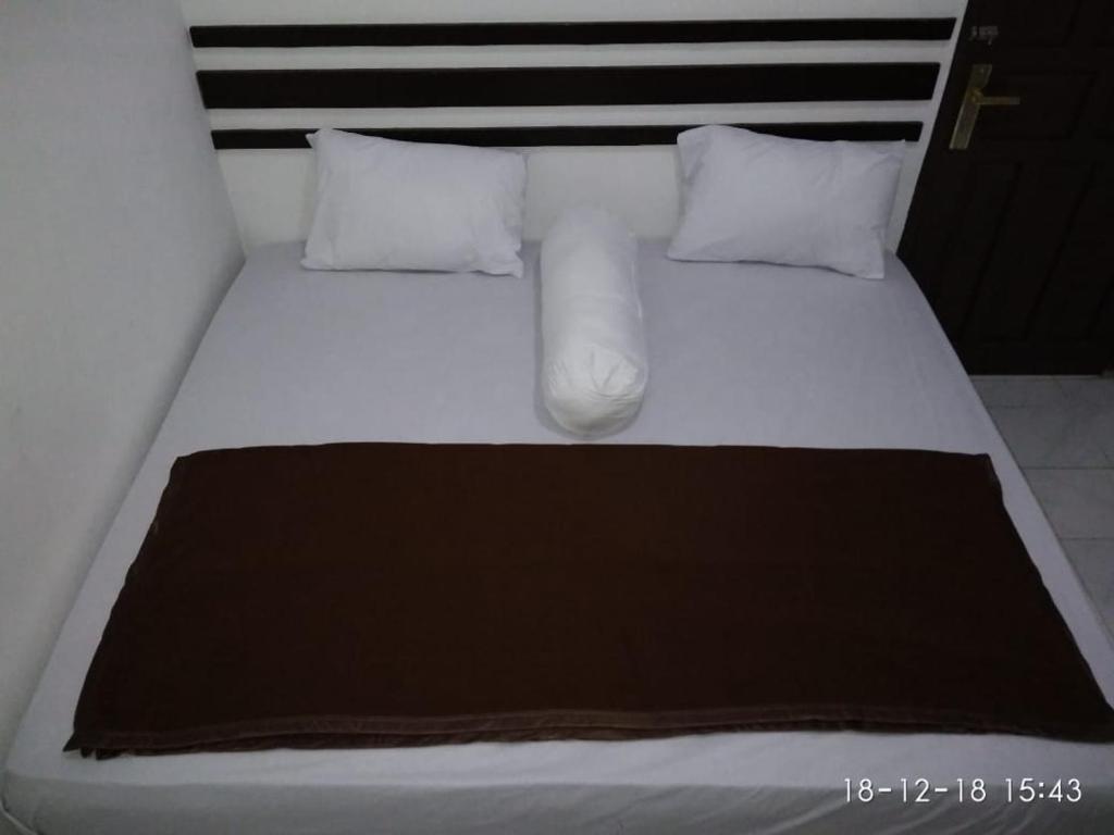 Postel nebo postele na pokoji v ubytování skyz hostel