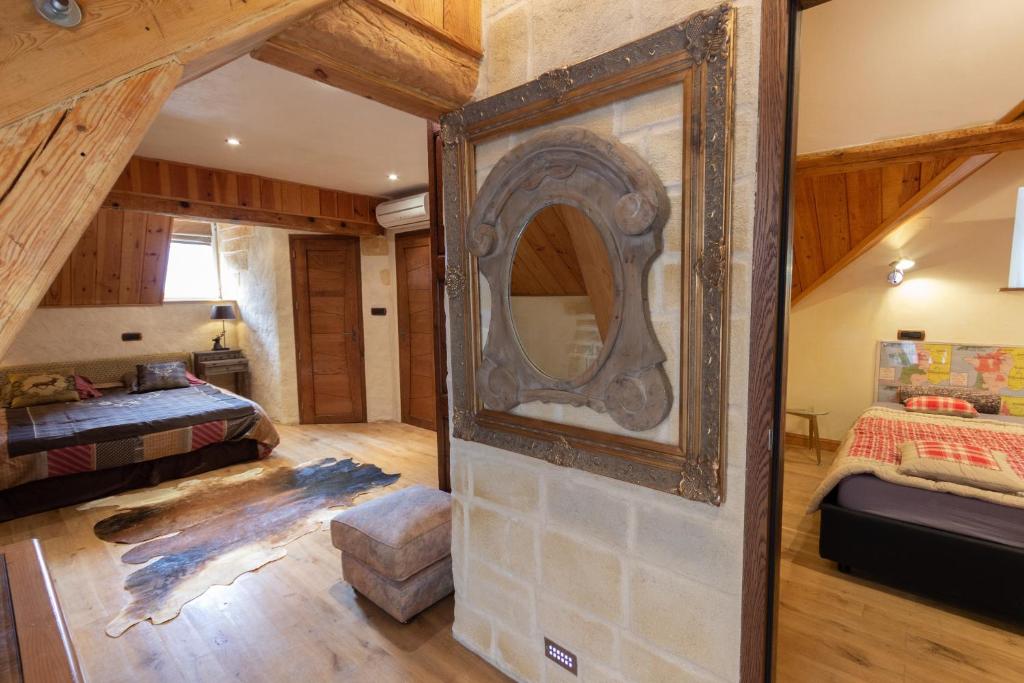 Postel nebo postele na pokoji v ubytování Château de Druon