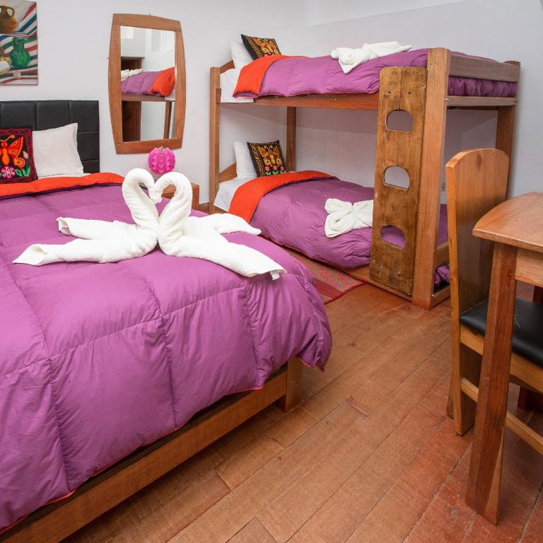 Postel nebo postele na pokoji v ubytování Hotel Inka King