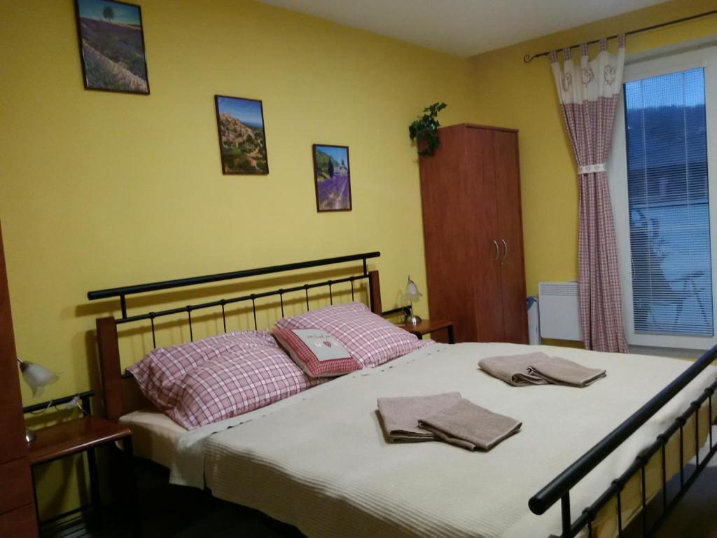 Postel nebo postele na pokoji v ubytování Apartmán Aqua Podhájska