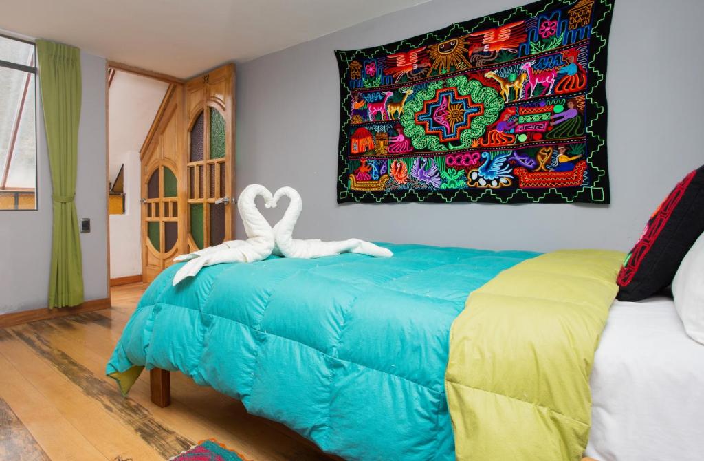 Postel nebo postele na pokoji v ubytování Hotel Inka King