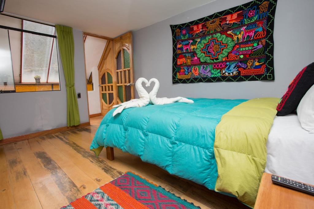 Postel nebo postele na pokoji v ubytování Hotel Inka King