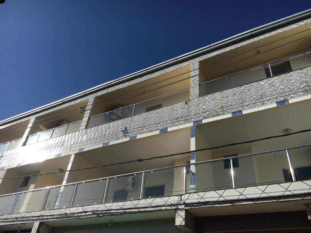 an apartment building with balconies on the side of it at Mica Flats in Prado