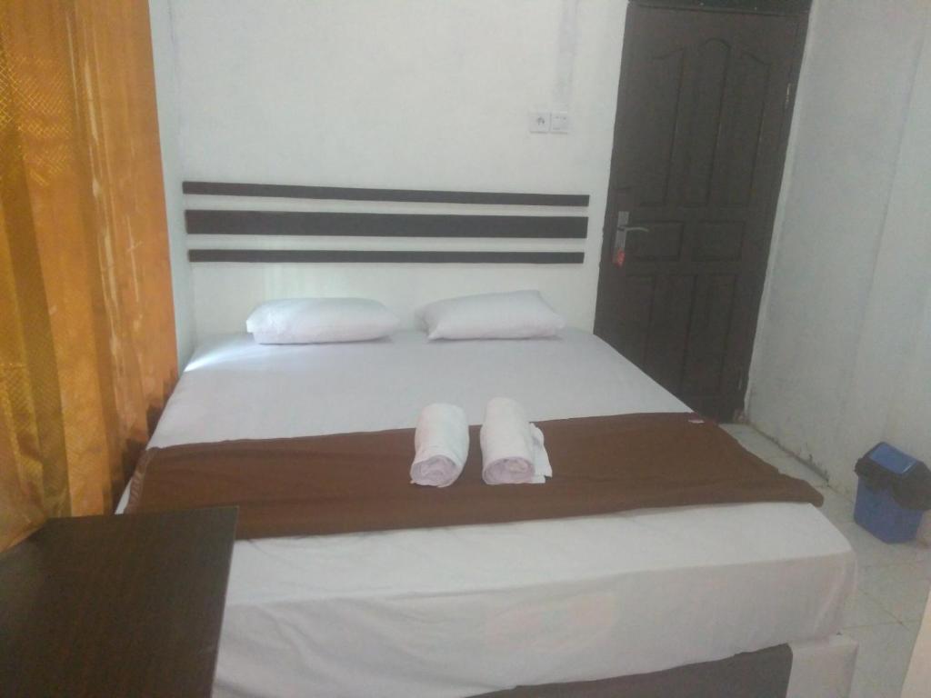 Postel nebo postele na pokoji v ubytování skyz hostel