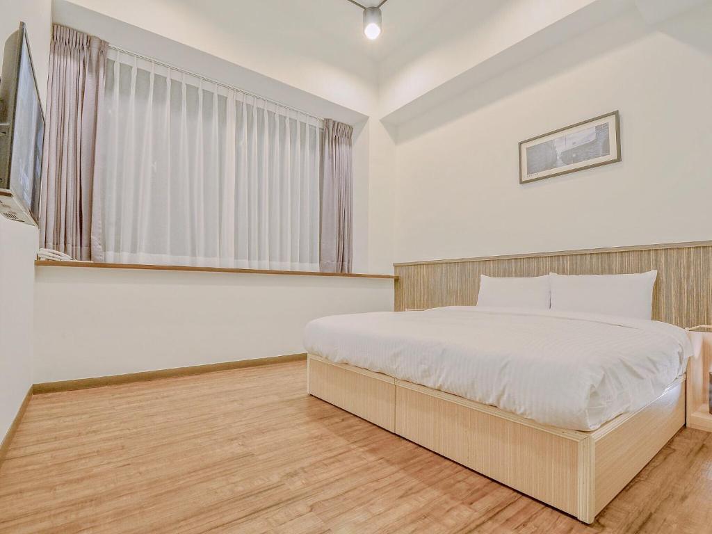 Postel nebo postele na pokoji v ubytování Calamari