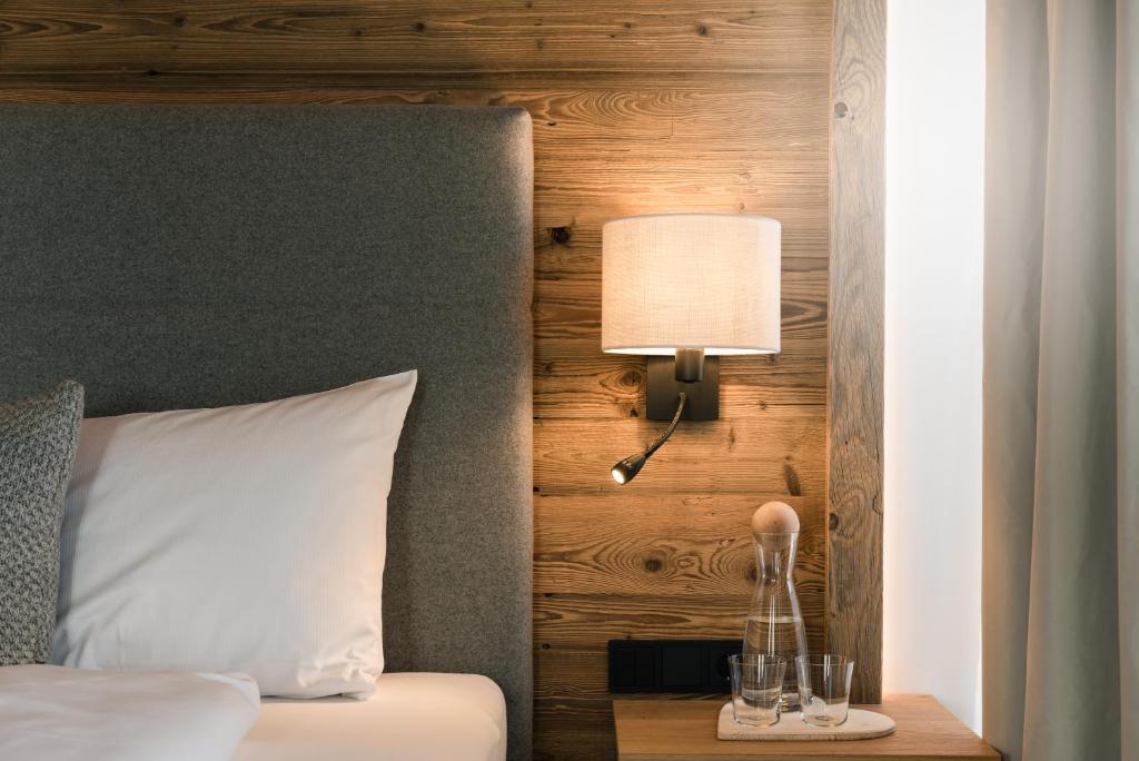 Postel nebo postele na pokoji v ubytování meiZeit Lodge
