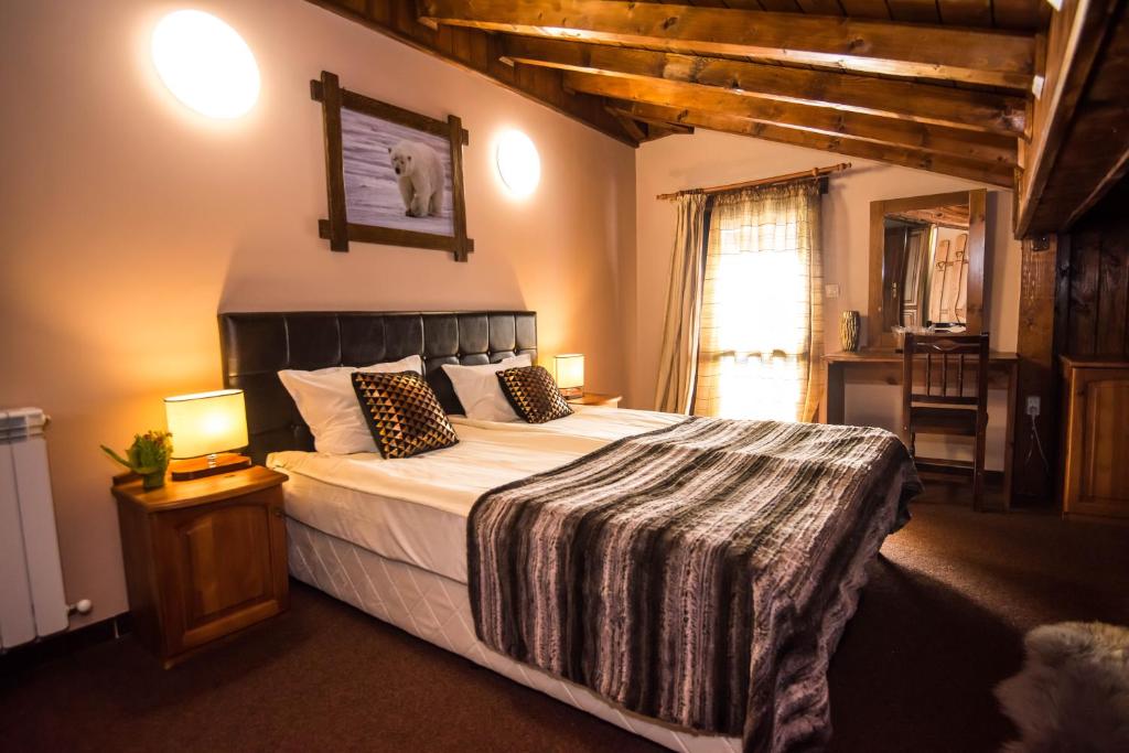 Postel nebo postele na pokoji v ubytování Elida Family Hotel