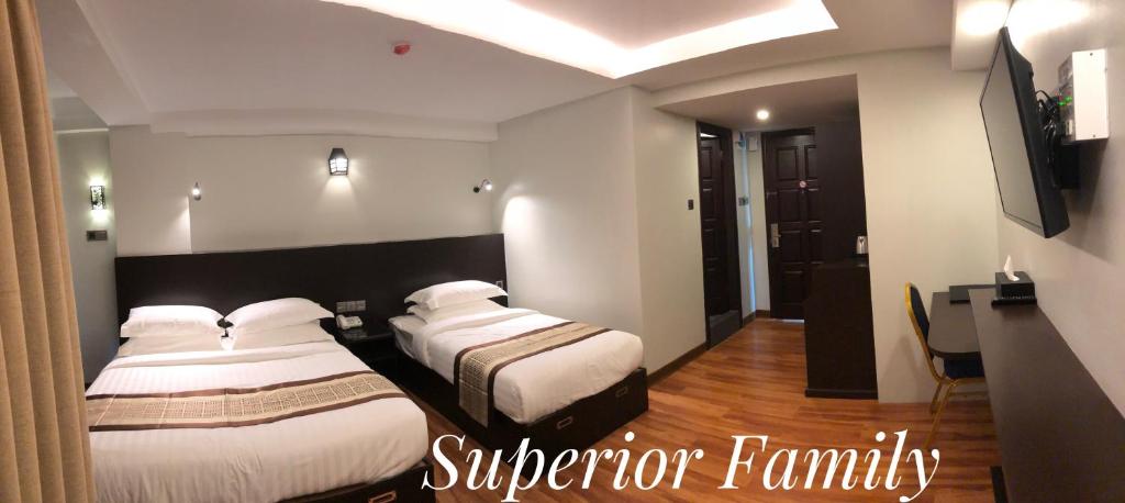 Voodi või voodid majutusasutuse Hotel Rose Hill toas