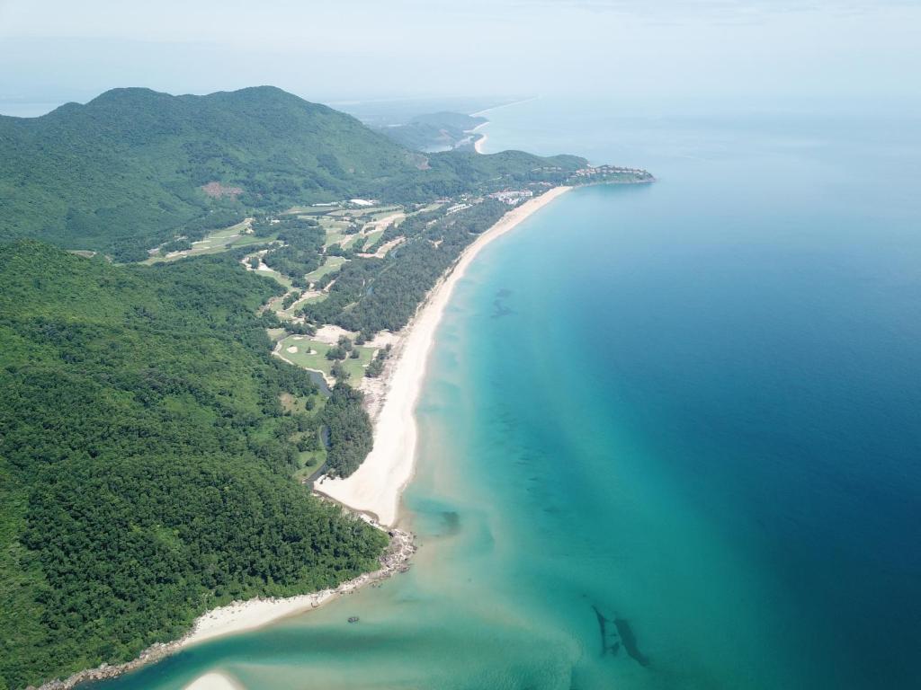 an aerial view of a beach and the ocean at CANH DUONG MOTEL in Lang Co