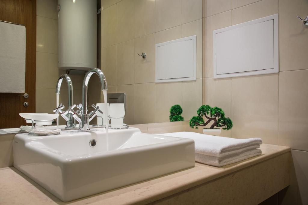 Koupelna v ubytování Effect Malina Residence Hotel