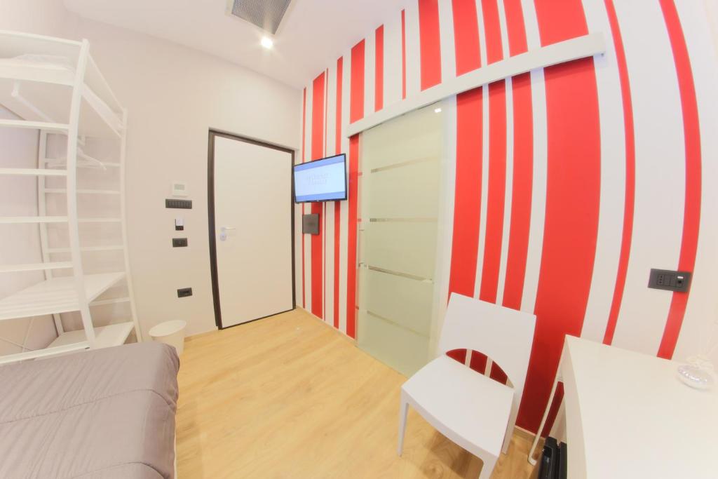 Postel nebo postele na pokoji v ubytování RESIDENZE CASSOLI - Lamezia Centro