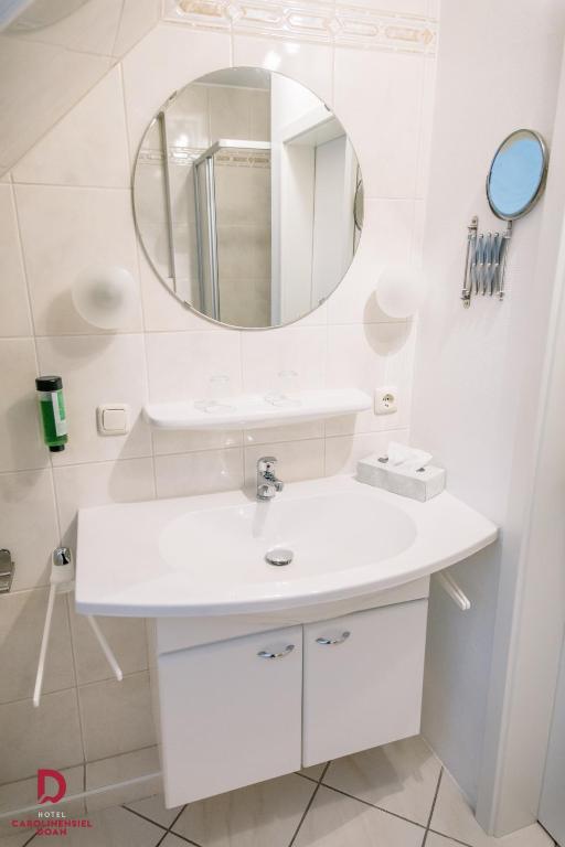 Koupelna v ubytování Hotel Carolinensiel Doan