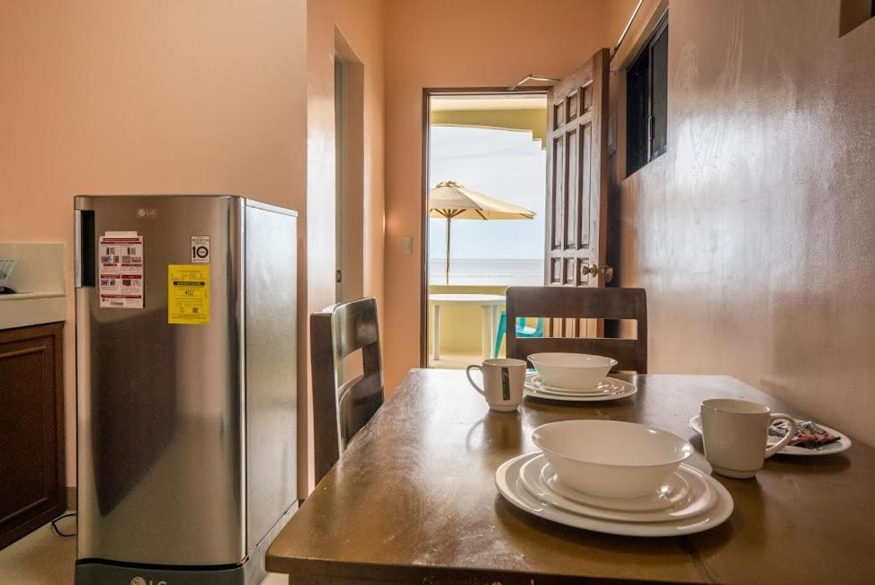 Kuchyň nebo kuchyňský kout v ubytování Kellocks' Seaview Apartelle