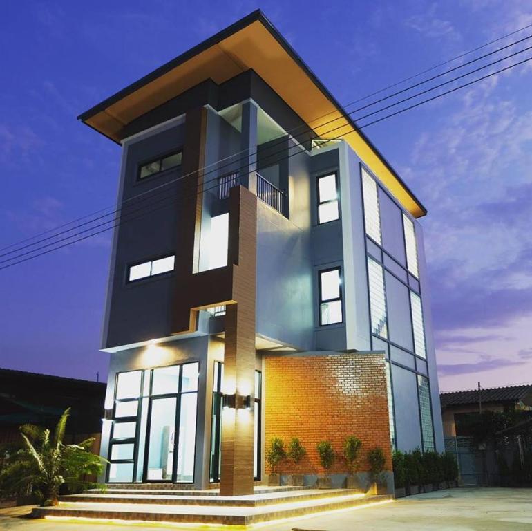 a rendering of a modern house at บ้านรวมสุข the Happiness in Chiang Kham