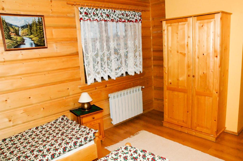 Posteľ alebo postele v izbe v ubytovaní Willa Pod Stokiem
