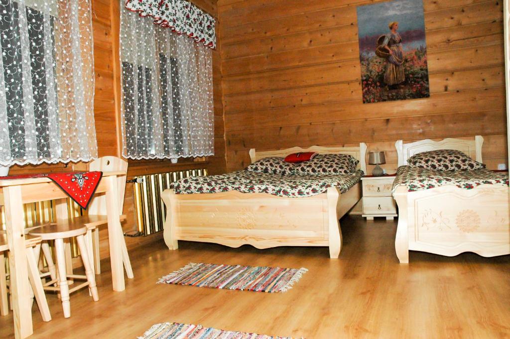 Posteľ alebo postele v izbe v ubytovaní Willa Pod Stokiem