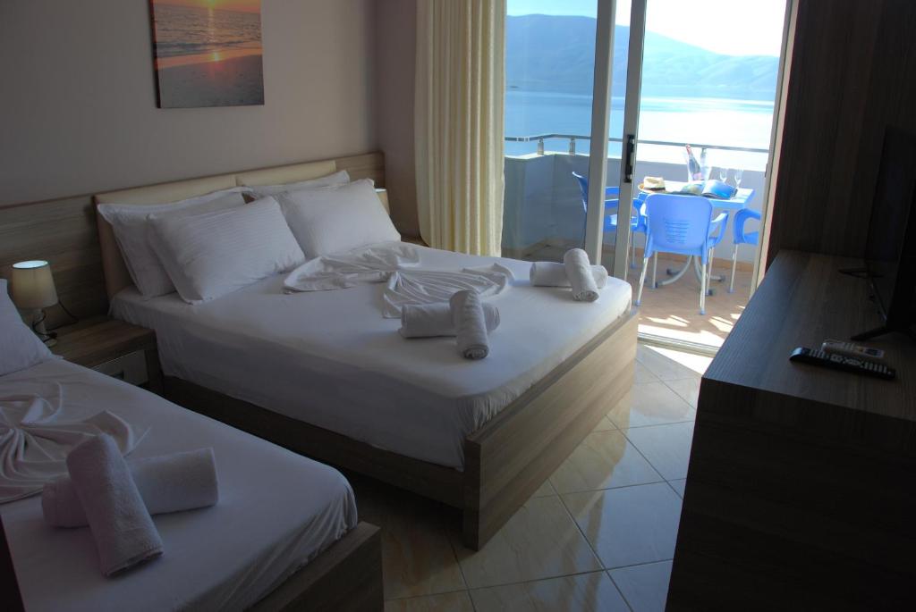Postel nebo postele na pokoji v ubytování Hotel Divers